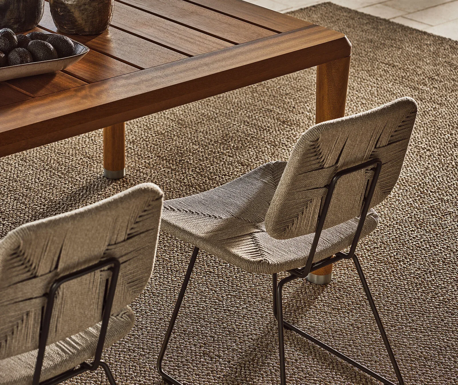 Flexform Echoes outdoor chair in a garden setting, frame 4