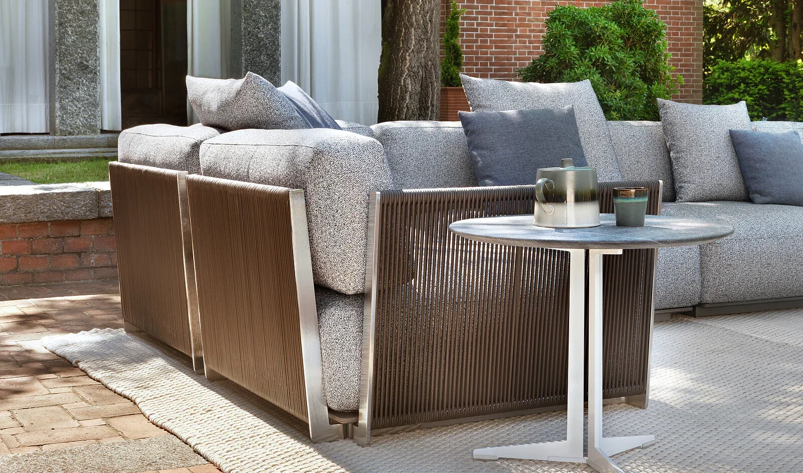 Flexform Fly outdoor coffee table, photographed for the factory catalogue