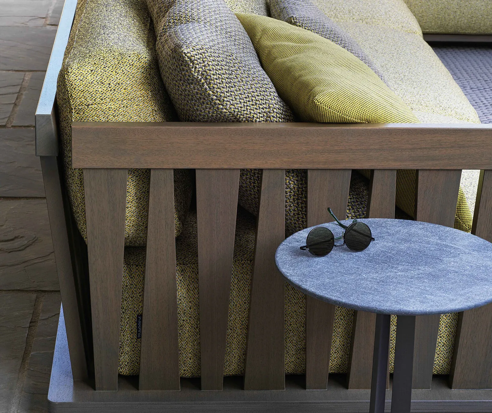 Flexform Zante outdoor sofa in a garden setting, frame 1
